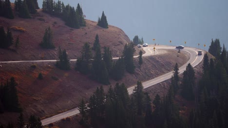 cars driving through the independence pass in colorado