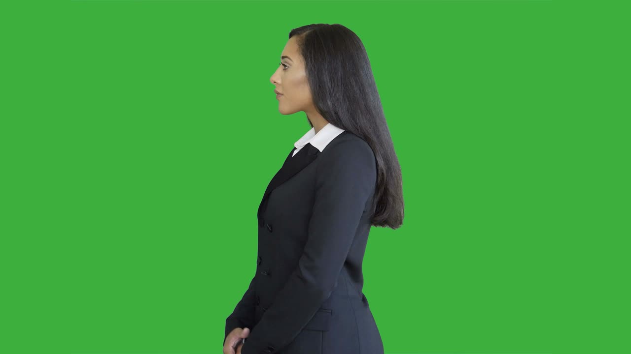 Lifestyle Portrait of Young African American Business Woman Isolated on Green Screen Chroma key Background