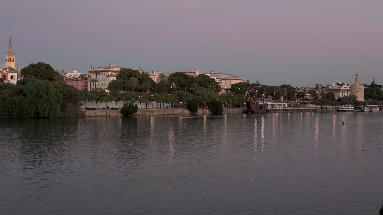 river of a city with Roman architecture, kayaking and canoeing are tourist activities in Seville, Spain