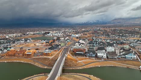 stunning aerial view before storm at south jordan utah - aerial truck left and panning shot