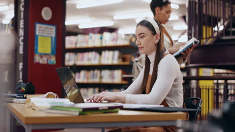 woman studying in a library