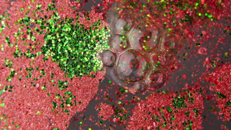 red and green glitter bubbles