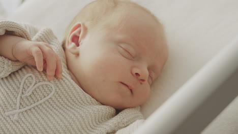sleeping baby in a crib