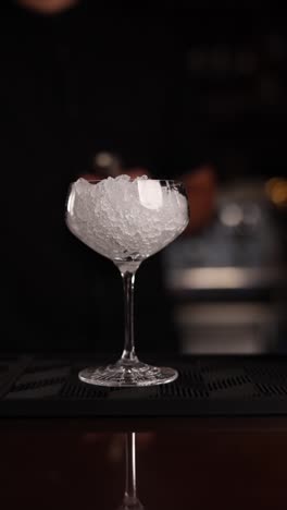 cocktail preparation with ice