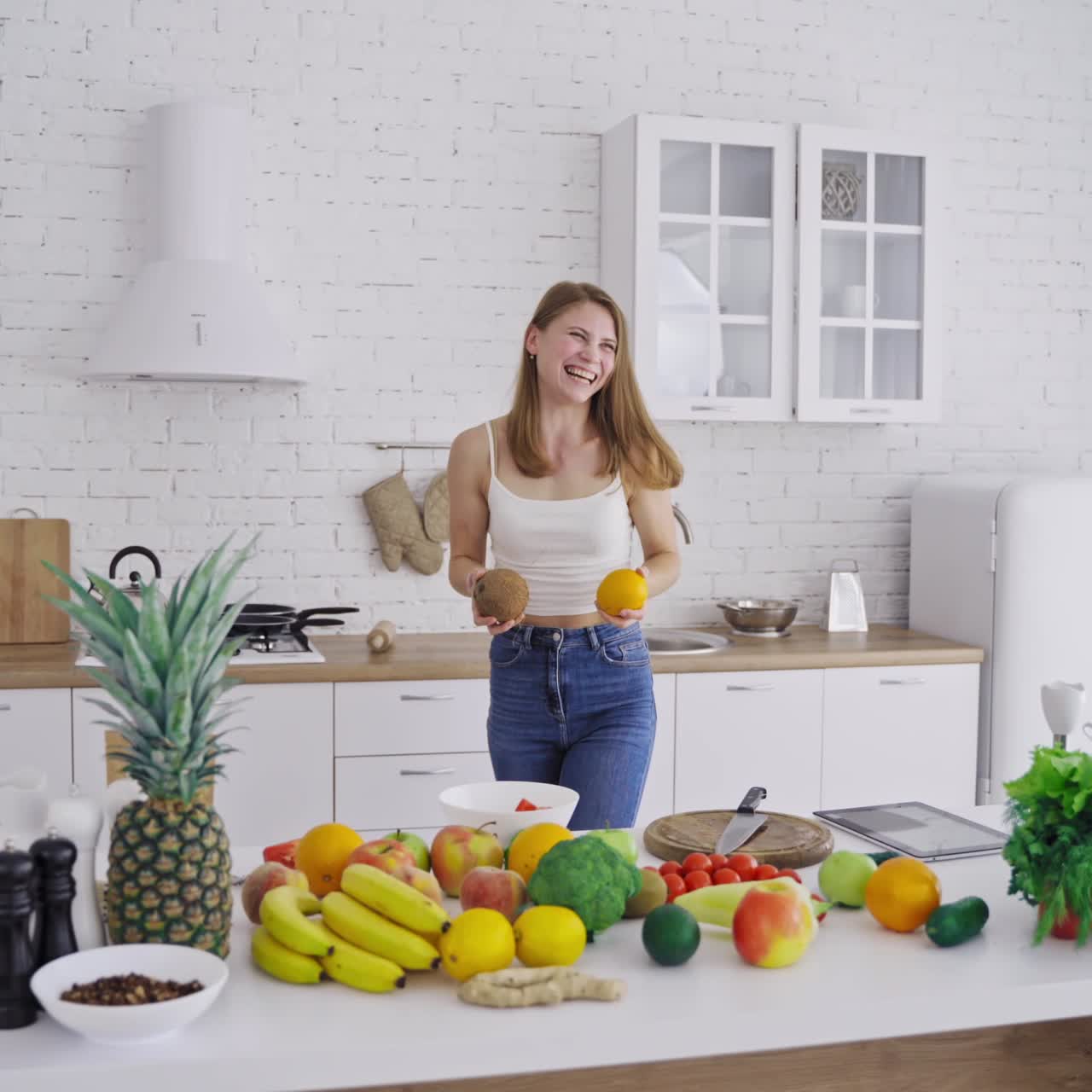 Smiling woman with fruits