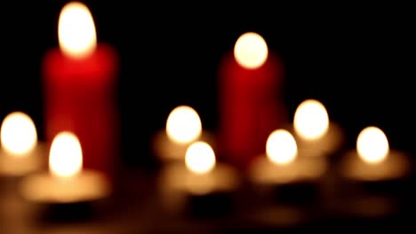 burning candles light bokeh slider