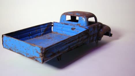 old and rusty vintage soviet era metal tinplate toy truck without wheels