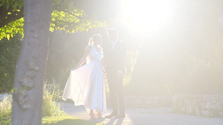 Couple in love at sunset in a garden