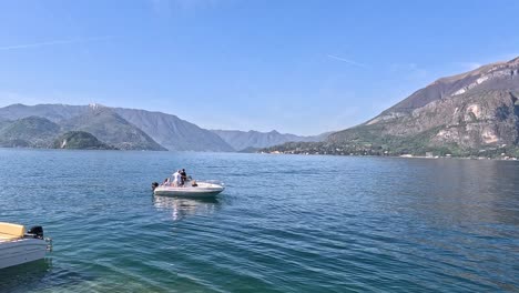 people boating with scenic mountain views