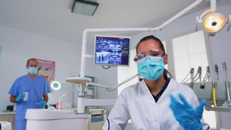 doctor specialist talking with patient in stomatology clinic