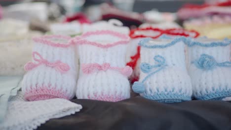 adorable knitted baby booties in pink and blue