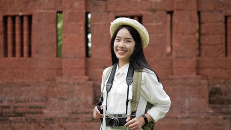 traveler woman looking at camera