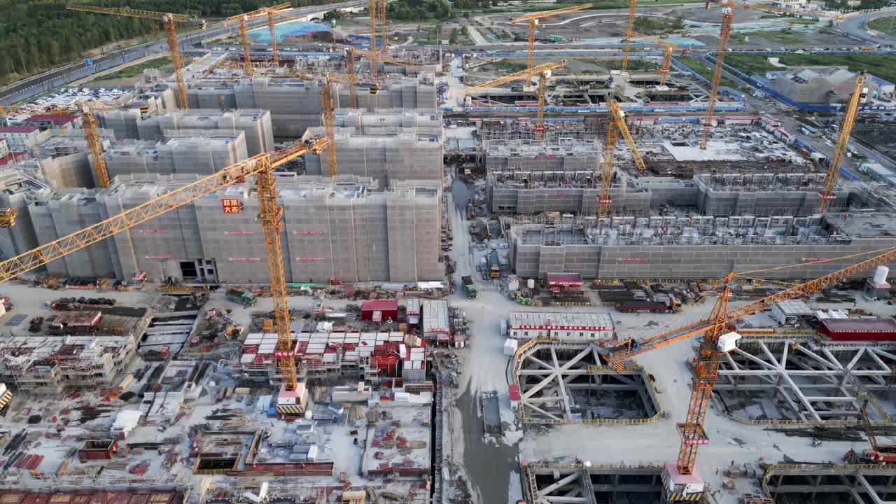 construction site aerial drone close up bolding crane