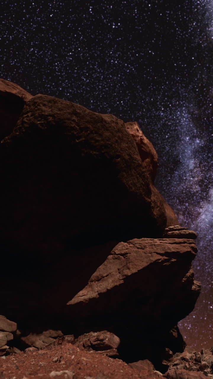 rocas rojas bajo la vía láctea