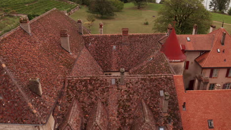 Aerial-of-beautiful-old-building,-tilting-down-to-courtyard