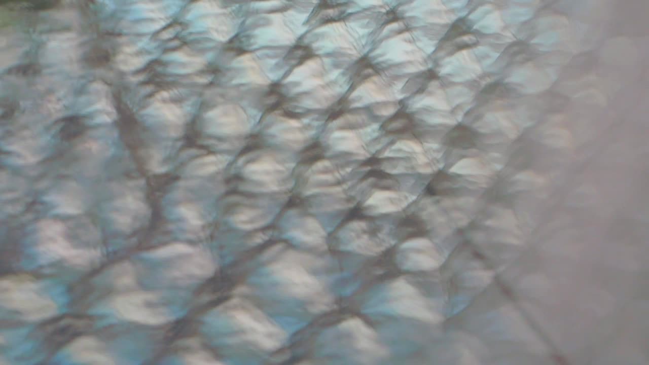 Abstract Wavy Glass Texture with Light Reflection