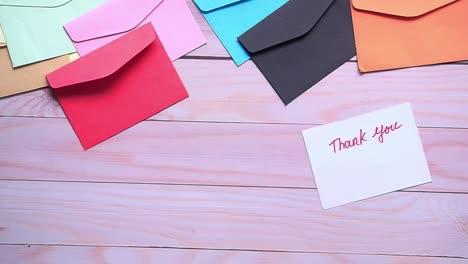 colorful envelopes and a thank you note