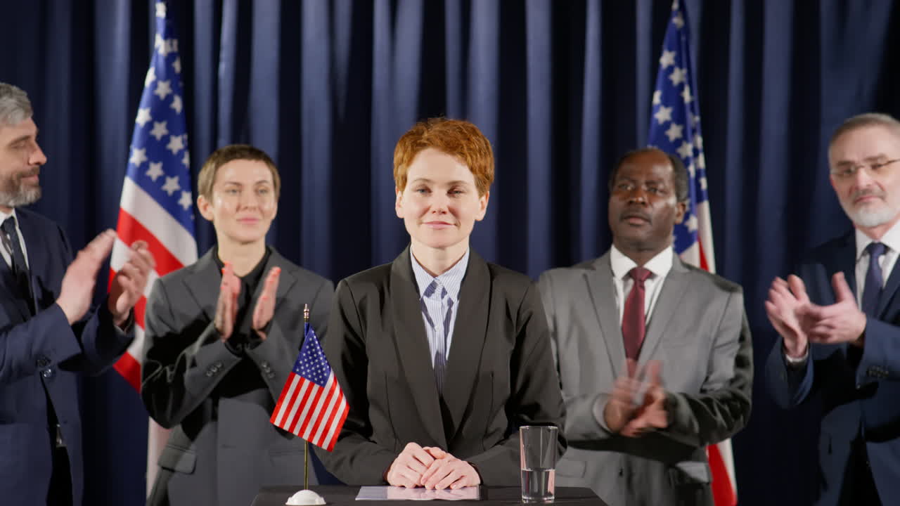 Female Politician Making Public Announcement and Smiling