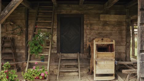 rustic farmhouse with old tools and plants