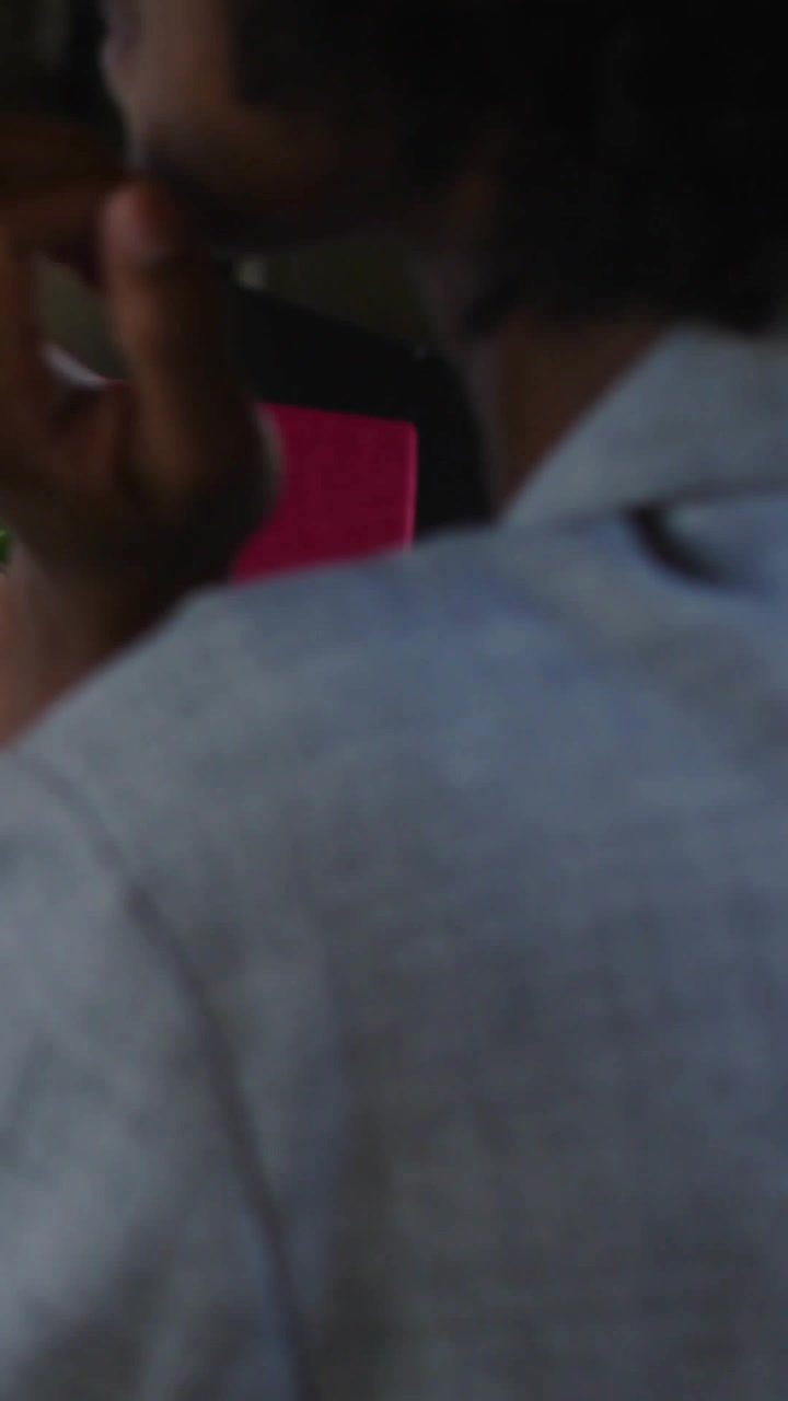 Call starting, woman holding phone, frame pulling back revealing desk, bars rising showing audio