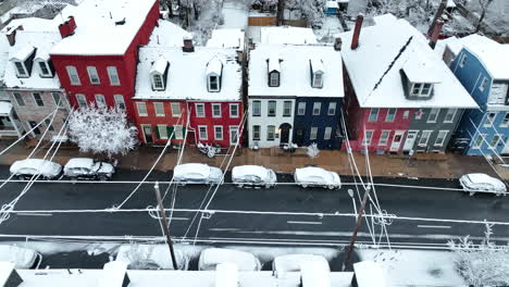 Colorful-row-homes-in-urban-city-in-USA-during-winter-snowstorm