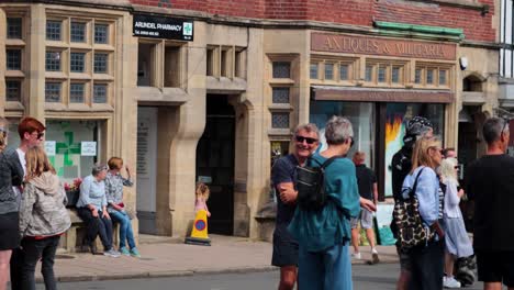 people enjoying a lively street festival