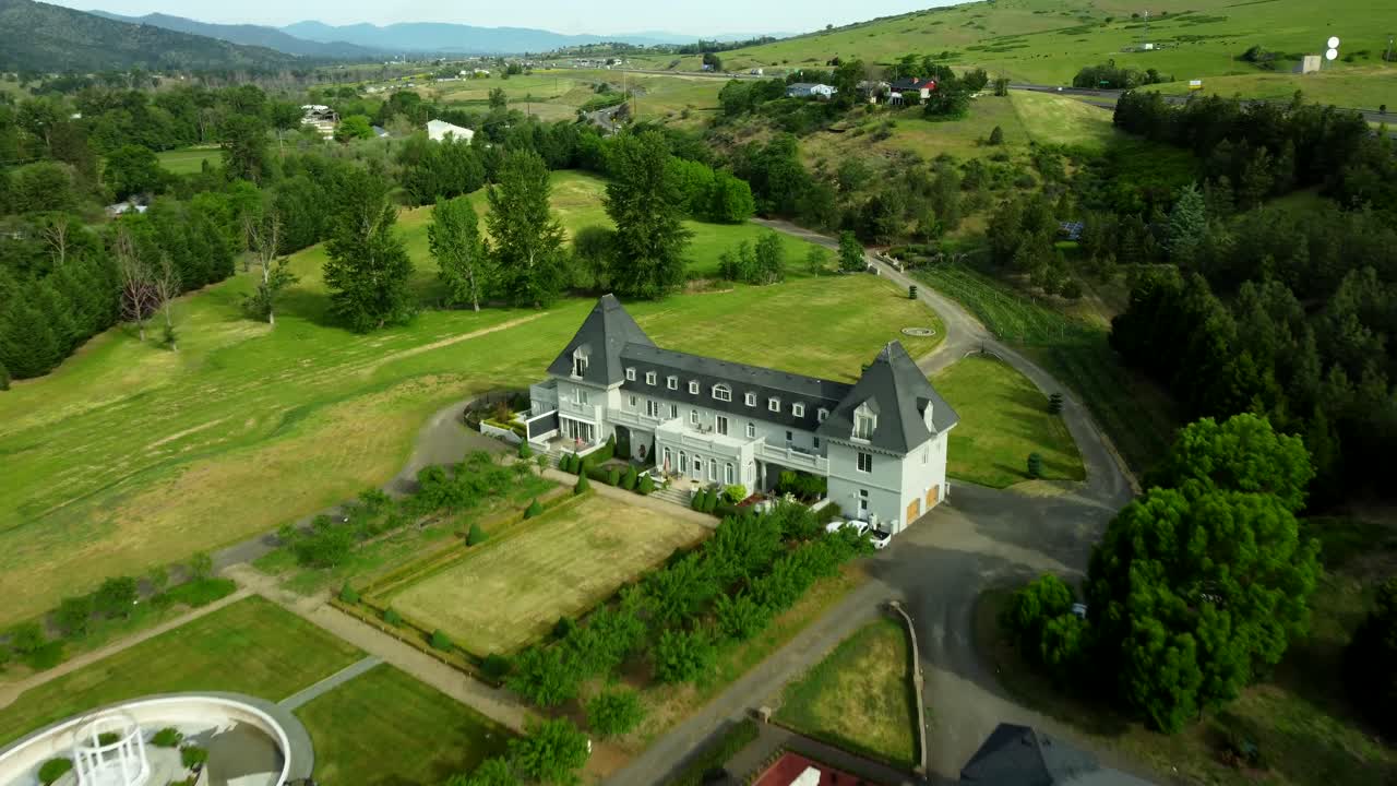 USA, OR, Ashland, Chateau Herbe, 2024-05-14 - Magnificent estate in Ashland is built in the style of a French chateau. 27 acre estate, rose garden, Trevi fountain, and manicured lawns.