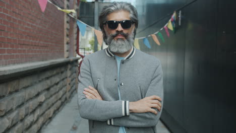 stylish man in urban alley