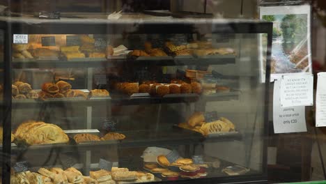 bakery goods displayed in a shop window