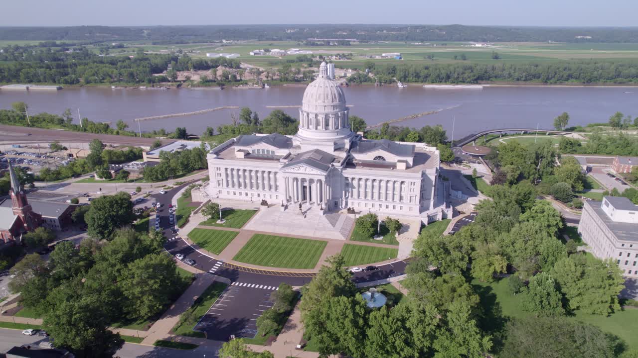 This drone video offers a bird's-eye view of the lush landscapes, stately columns, and the vibrant heart of Jefferson City.
