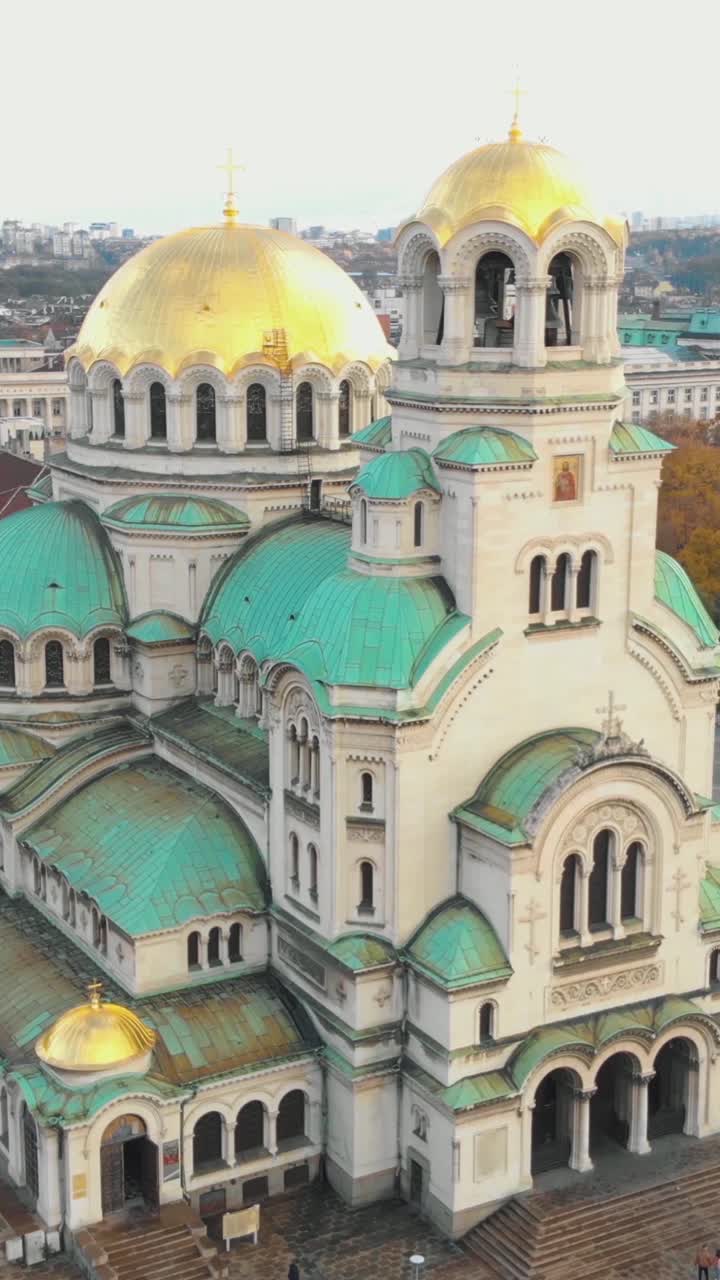 Aerial view of the magnificent Alexander Nevsky Cathedral in Sofia, Bulgaria, highlighting its stunning architecture and vibrant colors. Vertical Video