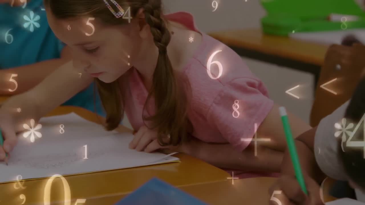 Schoolchildren writing while numbers and symbols move