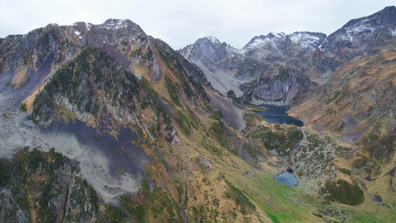 Scenic view of Ilhéou Lake in Pyrenees, perfect for serene hiking vibes