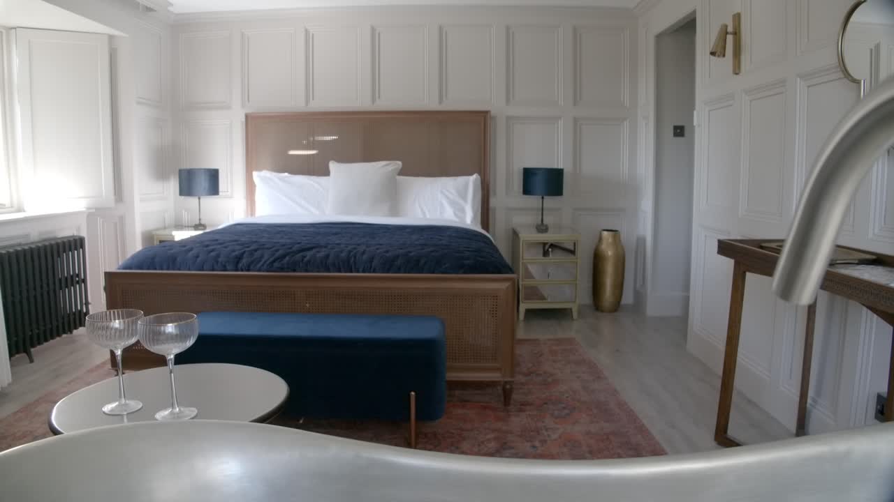 Step into luxury and comfort with a glimpse of this master bedroom retreat, where elegance meets tranquility in every carefully curated detail