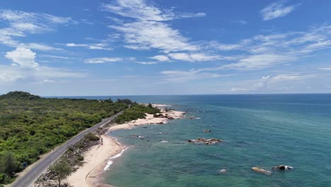 aerial view dolly of the road and the coast in ho tram in the afternoon