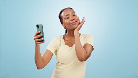 Phone,-selfie-and-happy-black-woman-in-a-studio