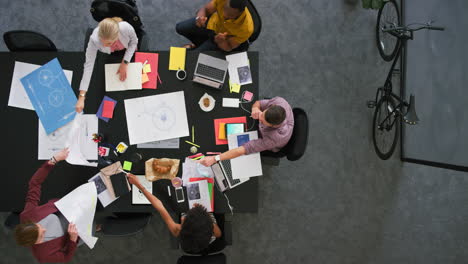 Group-of-diverse-colleagues-using-technology