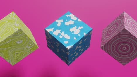 animated cubes with abstract patterns on a pink background. seamless loop 3d render abstract animation