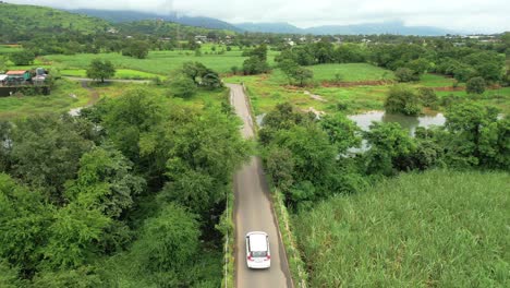 car going to pawana lake in greenry village in pune