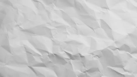animation of crumpled white paper moving on seamless loop