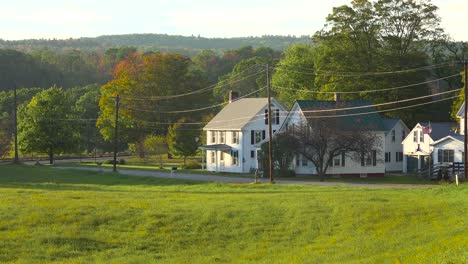 a quaint rural scene in a small village in new england