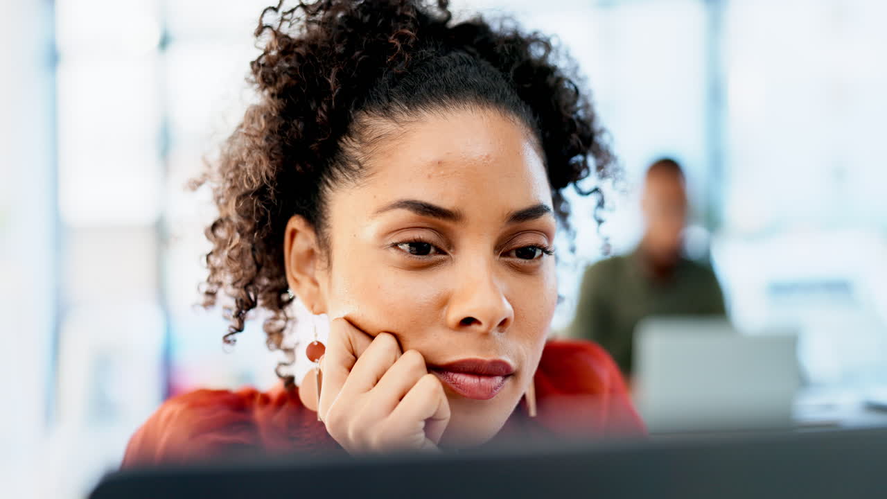 Business woman, face and reading on laptop