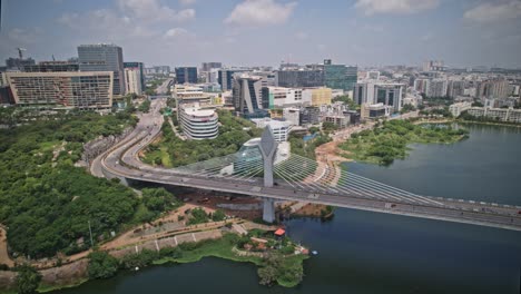 this hyperlapse shows indian city, which connects the historic city with the modern tech city through the busy movements of its vehicles on the famous cable bridge