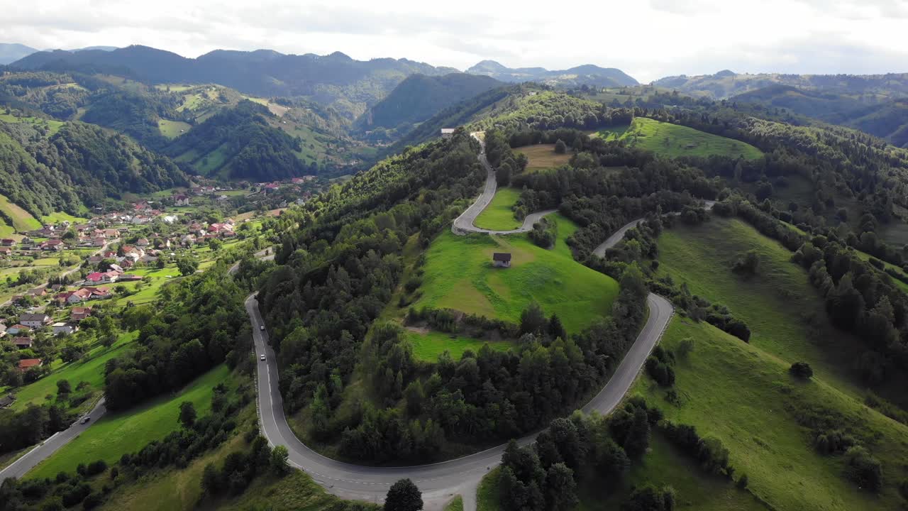 Aerial drone view of the Rucar-Bran mountain Pass inking the counties of Brasov and Arges in Romania