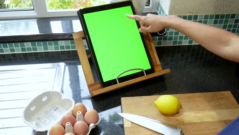 Cooking--baking-preparation-with-a-green-screen-tablet-recipe