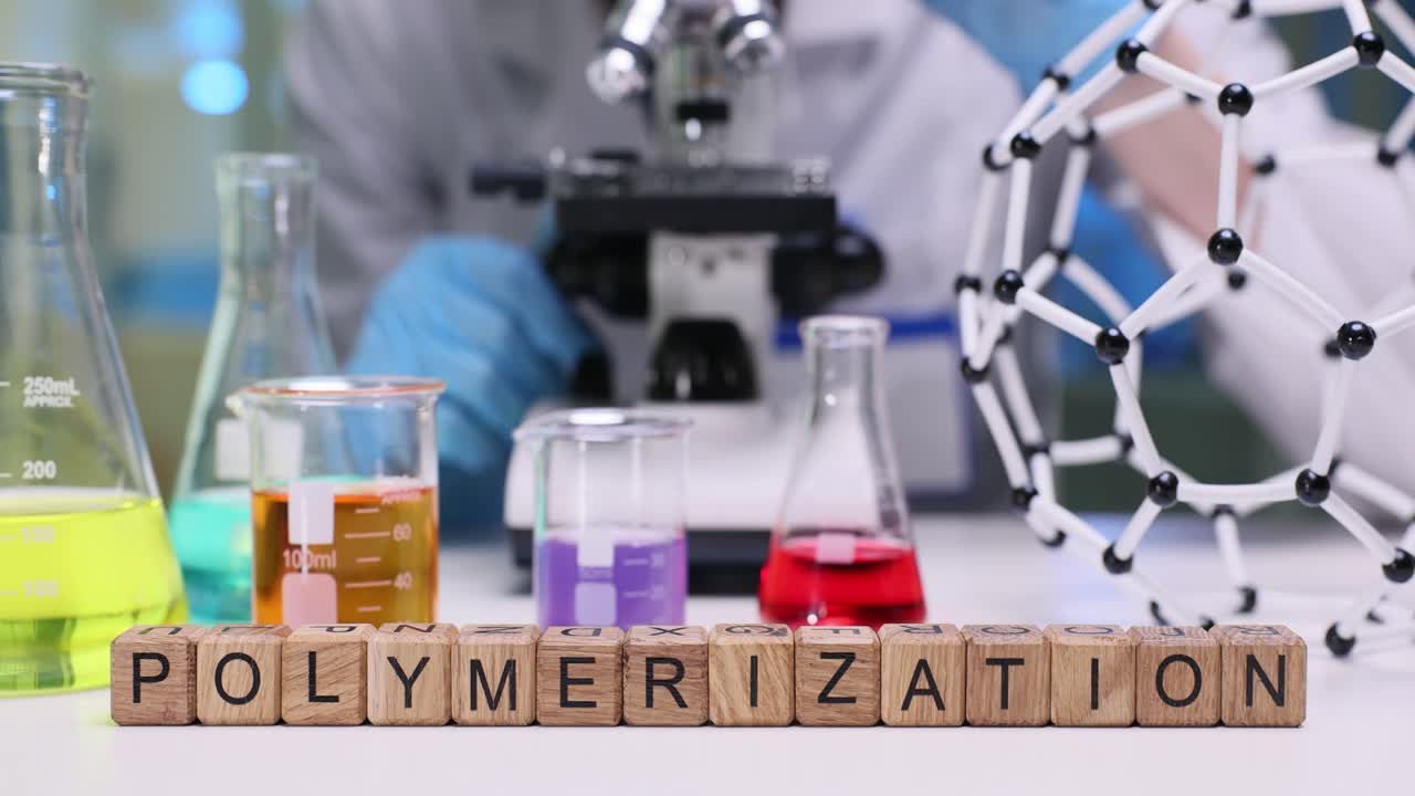 Polymerization Word in Chemistry Lab with Scientist and Equipment