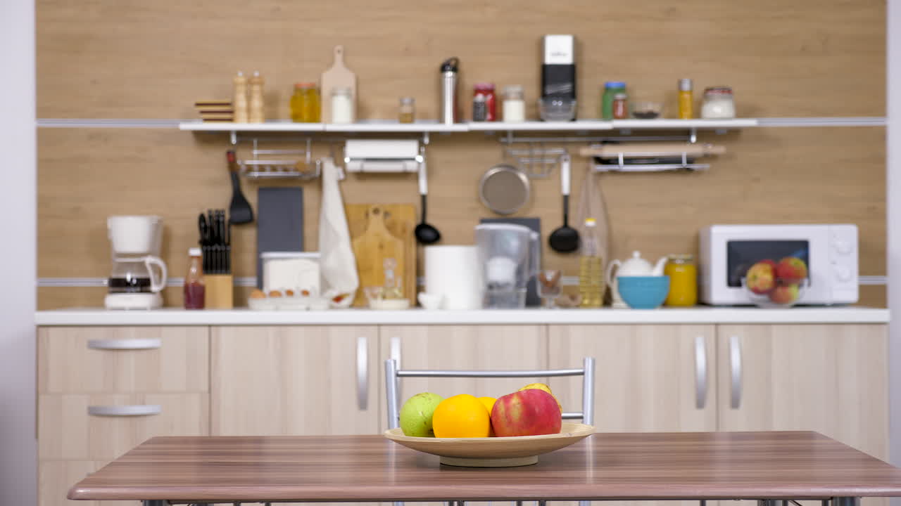 Kitchen interior with fruit bowl on the table