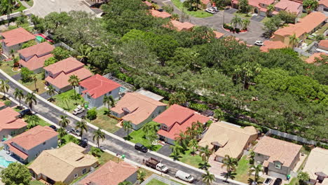 drone shot of upscale homes with pools in fort lauderdale isles neighborhood, florida usa