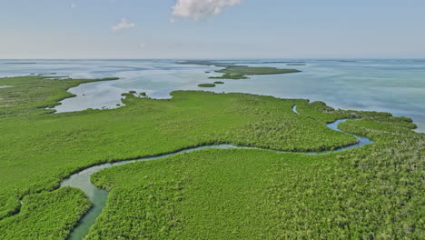 key west florida aerial v33 cinematic drone flyover fivemile creek leading to the sea capturing beautiful landscape of mangroves line up the coastal shoreline - shot with mavic 3 cine - february 2023