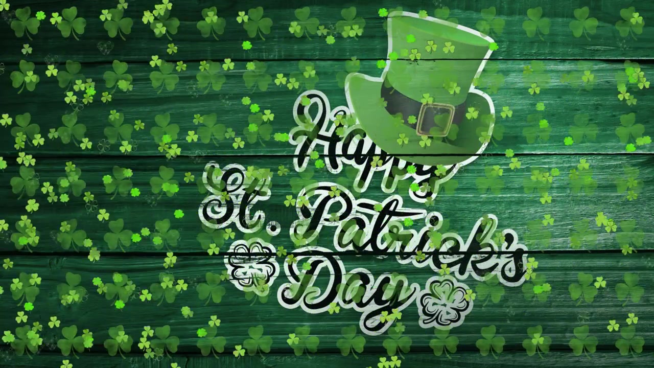Tréboles apareciendo por la izquierda, flotando sobre un saludo y un sombrero centrados, creando un ambiente festivo del Día de San Patricio.